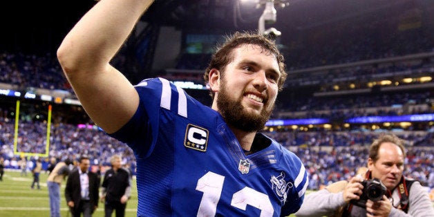 INDIANAPOLIS, IN - JANUARY 04: Quarterback Andrew Luck #12 of the Indianapolis Colts celebrates after defeating the Kansas C