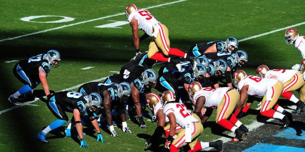 CHARLOTTE, NC - JANUARY 12: Ahmad Brooks #55 of the San Francisco 49ers jumps offsides against the Carolina Panthers at Bank of America Stadium on January 12, 2014 in Charlotte, North Carolina. (Photo by Scott Cunningham/Getty Images)