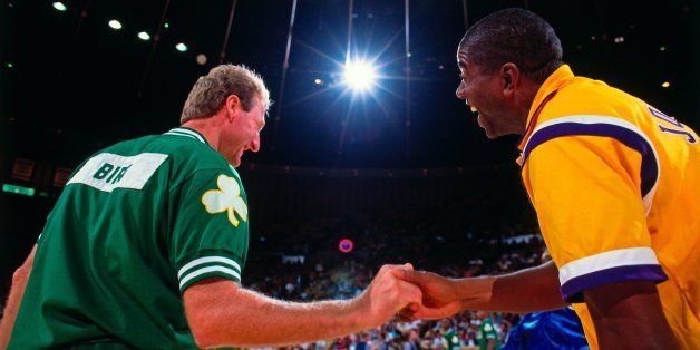 INGLEWOOD, CA - 1991: Magic Johnson #32 of the Los Angeles Lakers greets Larry Bird #33 of the Boston Celtics prior to the games during the 1991 NBA season at The Great Western Forum in Inglewood, California. NOTE TO USER: User expressly acknowledges and agrees that, by downloading and/or using this Photograph, user is consenting to the terms and conditions of the Getty Images License Agreement. Mandatory Copyright Notice: Copyright 1991 NBAE (Photo by Andrew D. Bernstein/NBAE via Getty Images)