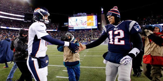 FOXBORO, MA - NOVEMBER 24: Quarterback Peyton Manning #18 of the Denver Broncos and quarterback Tom Brady #12 of the New England Patriots shake hands after the New England Patriots defeated the Denver Broncos 34-31 in overtime at Gillette Stadium on November 24, 2013 in Foxboro, Massachusetts. (Photo by Jim Rogash/Getty Images)