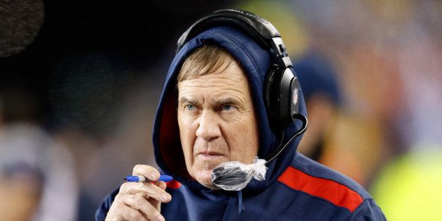 FOXBORO, MA - JANUARY 11: Head coach Bill Belichick of the New England Patriots looks on against the Indianapolis Colts during the AFC Divisional Playoff game at Gillette Stadium on January 11, 2014 in Foxboro, Massachusetts. (Photo by Jim Rogash/Getty Images)