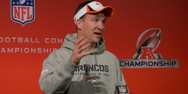 ENGLEWOOD, CO - JANUARY 15: Denver Broncos quarterback Peyton Manning (18) addresses the media during his press conference Ja