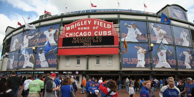 CHICAGO, IL - APRIL 08: General view of fans take pictures outside the main entrance to Wrigley Field before the Opening Day game between the Chicago Cubs and the Milwaukee Brewers on April 8, 2013 in Chicago, Illinois. (Photo by Jonathan Daniel/Getty Images)