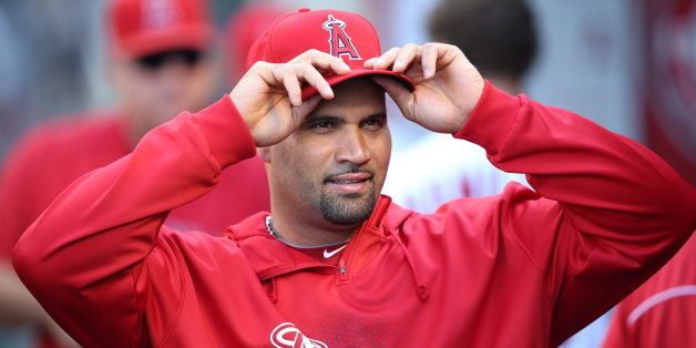 ANAHEIM, CA - AUGUST 21: Albert Pujols #5 of the Los Angeles Angels of Anaheim is seen in the dugout while on the disabled list during the game against the Cleveland Indians on Wednesday, August 21, 2013 at Angel Stadium in Anaheim, California. The Indians won the game 3-1. (Photo by Paul Spinelli/MLB Photos via Getty Images)