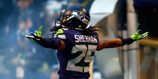 SEATTLE, WA - JANUARY 19: Cornerback Richard Sherman #25 of the Seattle Seahawks takes the field for the 2014 NFC Championship against the San Francisco 49ers at CenturyLink Field on January 19, 2014 in Seattle, Washington. (Photo by Jonathan Ferrey/Getty Images) 