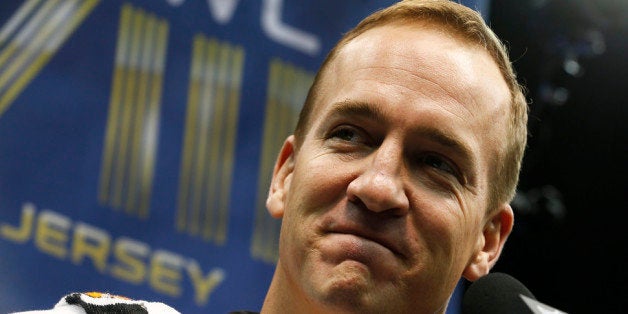 NEWARK, NJ - JANUARY 28: Quarterback Peyton Manning #18 of the Denver Broncos speaks to the media during Super Bowl XLVIII M