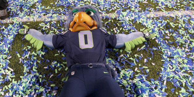 EAST RUTHERFORD, NJ - FEBRUARY 02: Blitz, the Seattle Seahawks mascot, does snow angels on the field after the Seahawks 43-8 victory against the Denver Broncos during Super Bowl XLVIII at MetLife Stadium on February 2, 2014 in East Rutherford, New Jersey. (Photo by Jeff Gross/Getty Images)