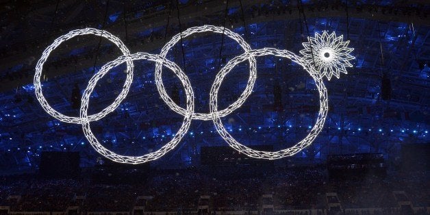 The Olympic rings are presented during the Opening Ceremony of the Sochi Winter Olympics at the Fisht Olympic Stadium on February 7, 2014 in Sochi. AFP PHOTO / ALBERTO PIZZOLI (Photo credit should read ALBERTO PIZZOLI/AFP/Getty Images)