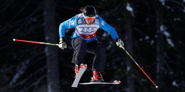 SAN CANDIDO, ITALY - DECEMBER 22: Jenny Owens of Australia races down the course during the official training session and qualification for the Audi FIS Freestyle Skiing World Cup Skier Cross race on December 22 2012 in San Candido, Italy. (Photo by Mitchell Gunn/Getty Images)