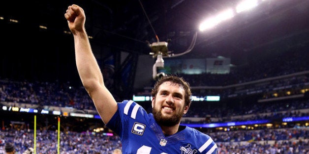 INDIANAPOLIS, IN - JANUARY 04: Quarterback Andrew Luck #12 of the Indianapolis Colts celebrates after defeating the Kansas C