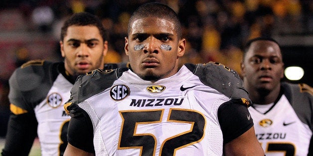 OXFORD, MS - NOVEMBER 23: Michael Sam #52 of the Missouri Tigers participates in pregame activities prior to a game against