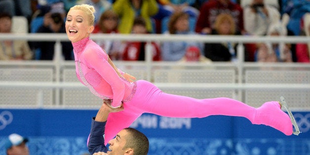 Germany's Aliona Savchenko and Germany's Robin Szolkowy perform in the Figure Skating Pairs Short Program at the Iceberg Skating Palace during the 2014 Sochi Winter Olympics on February 11, 2014. AFP PHOTO / DAMIEN MEYER (Photo credit should read DAMIEN MEYER/AFP/Getty Images)