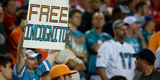 TAMPA, FL - NOVEMBER 11: A Miami Dolphins fan holds a sign for Richie Incognito during a game against the Tampa Bay Buccaneers at Raymond James Stadium on November 11, 2013 in Tampa, Florida. (Photo by Mike Ehrmann/Getty Images)