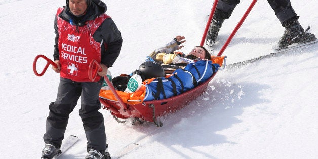 Sochi, Russia - February 16 - SSOLY- American Jacqueline Hernandez gets brought down the hill after a crash in qualifiers.