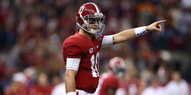 NEW ORLEANS, LA - JANUARY 02: AJ McCarron #10 of the Alabama Crimson Tide calls a play against the Oklahoma Sooners during the Allstate Sugar Bowl at the Mercedes-Benz Superdome on January 2, 2014 in New Orleans, Louisiana. (Photo by Streeter Lecka/Getty Images)