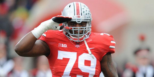 COLUMBUS, OHIO - NOVEMBER 23, 2013: Offensive linemen Marcus Hall #79 of the Ohio State Buckeyes is introduced during senior day festivities before a game against the Indiana Hoosiers at Ohio Stadium in Columbus, Ohio. The Buckeyes won 42-14. (Photo by David Dermer/Diamond Images/Getty Images)