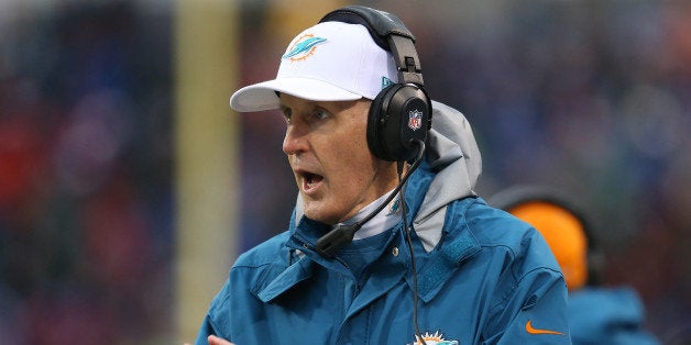 ORCHARD PARK, NY - DECEMBER 22: Head coach Joe Philbin of the Miami Dolphins reacts during NFL game action against the Buffal