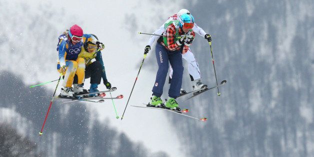 SOCHI, RUSSIA - FEBRUARY 21: Marielle Thompson of Canada leads from Sandra Naeslund (L) of Sweden, Katya Crema (yellow top) of Australia and Ophelie David (red top) of France in the Freestyle Skiing Womens' Ski Cross Semifinals on day 14 of the 2014 Winter Olympics at Rosa Khutor Extreme Park on February 21, 2014 in Sochi, Russia. (Photo by Cameron Spencer/Getty Images)