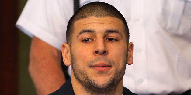 ATTLEBORO, MA - AUGUST 22: Former New England Patriots player Aaron Hernandez at Attleboro District Court indicted on a charge of first-degree murder in the slaying of a Odin Lloyd, a Boston man whose bullet-riddled body was found in a North Attleborough industrial park in June. (Photo by John Tlumacki/The Boston Globe via Getty Images)