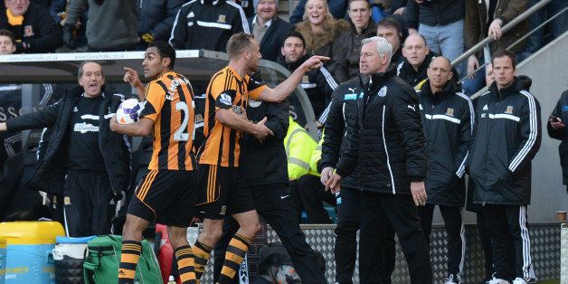 HULL, ENGLAND - MARCH 01: David Meyler of Hull City reacts to Alan Pardew, manager of Newcastle United during the Barclays Premier League match between Hull City and Newcastle United at KC Stadium on March 1, 2014 in Hull, England. (Photo by Tony Marshall/Getty Images)