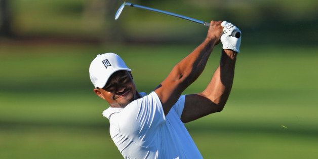 PALM BEACH GARDENS, FL - MARCH 01: Tiger Woods plays a shot during the third round of The Honda Classic at PGA National Resort and Spa on March 1, 2014 in Palm Beach Gardens, Florida. (Photo by Stuart Franklin/Getty Images)