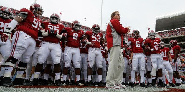 TUSCALOOSA, AL - NOVEMBER 23: Head coach Nick Saban of the Alabama Crimson Tide leads his team on the field to face the Chattanooga Mocs at Bryant-Denny Stadium on November 23, 2013 in Tuscaloosa, Alabama. (Photo by Kevin C. Cox/Getty Images)