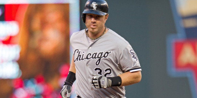 MINNEAPOLIS, MN - AUGUST 16: Adam Dunn #32 of the Chicago White Sox rounds the bases after hitting a home run against the Minnesota Twins on August 16, 2013 at Target Field in Minneapolis, Minnesota. The White Sox defeated the Minnesota Twins 5-2. (Photo by Brace Hemmelgarn/Minnesota Twins/Getty Images)