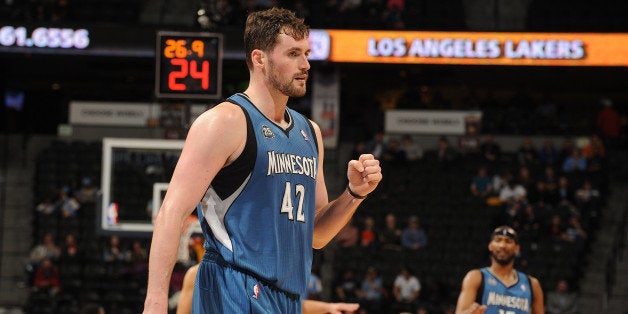 DENVER, CO - March 3: Kevin Love #42 of the Minnesota Timberwolves celebrates during the game against the Denver Nuggets on March 3, 2014 at the Pepsi Center in Denver, Colorado. NOTE TO USER: User expressly acknowledges and agrees that, by downloading and/or using this Photograph, user is consenting to the terms and conditions of the Getty Images License Agreement. Mandatory Copyright Notice: Copyright 2014 NBAE (Photo by Bart Young/NBAE via Getty Images)