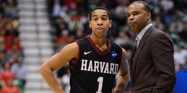 SALT LAKE CITY, UT - MARCH 21: Head coach Tommy Amaker of the Harvard Crimson talks with Siyani Chambers #1 in the first half against the New Mexico Lobos during the second round of the 2013 NCAA Men's Basketball Tournament at EnergySolutions Arena on March 21, 2013 in Salt Lake City, Utah. (Photo by Harry How/Getty Images)