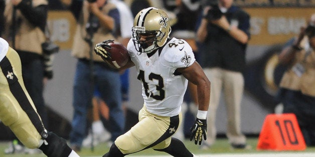 ST. LOUIS, MO - DECEMBER 15: Darren Sproles #43 of the New Orleans Saints rushes against the St. Louis Rams at the Edward Jones Dome on December 15, 2013 in St. Louis, Missouri. (Photo by Michael Thomas/Getty Images)