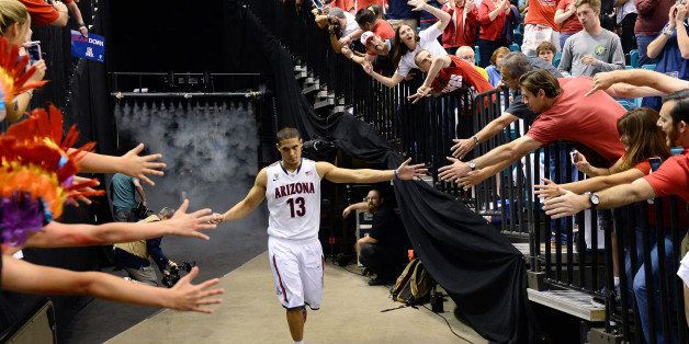 LAS VEGAS, NV - MARCH 15: Nick Johnson #13 of the Arizona Wildcats is introduced before the championship game of the Pac-12 Basketball Tournament against the UCLA Bruins at the MGM Grand Garden Arena on March 15, 2014 in Las Vegas, Nevada. UCLA won 75-71. (Photo by Ethan Miller/Getty Images)