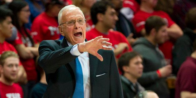 DALLAS, TX - FEBRUARY 6: SMU Mustangs head coach Larry Brown has words with his team against the Temple Owls on February 6, 2014 at Moody Coliseum in Dallas, Texas. (Photo by Cooper Neill/Getty Images)