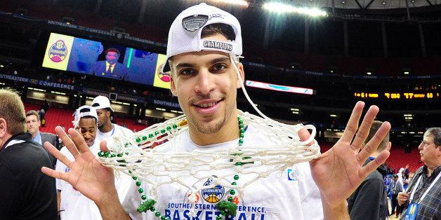 ATLANTA, GA - MARCH 16: Scottie Wilbekin #5 of the Florida Gators celebrates after the finals of the SEC Men's Basketball Tournament against the Kentucky Wildcats at the Georgia Dome on March 16, 2014 in Atlanta, Georgia. (Photo by Scott Cunningham/Getty Images)
