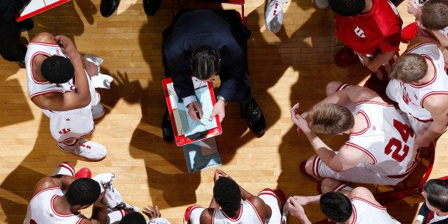 BLOOMINGTON, IN - DECEMBER 10: General view from above the Indiana Hoosiers huddle as head coach Tom Crean draws up a play during a timeout in the game against the Oakland Golden Grizzlies at Assembly Hall on December 10, 2013 in Bloomington, Indiana. The Hoosiers won the game 81-54. (Photo by Joe Robbins/Getty Images) 