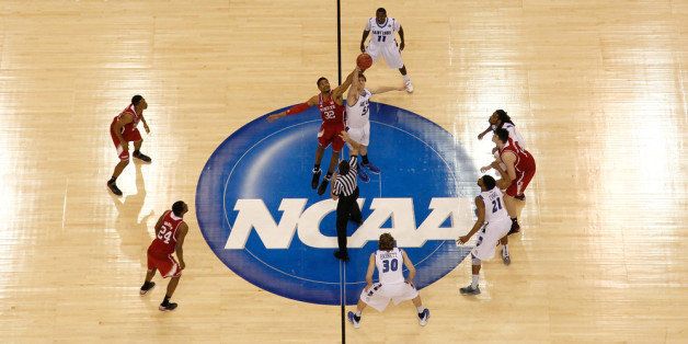 ORLANDO, FL - MARCH 20: The Saint Louis Billikens and NC State Wolfpack tip off during the second round of the 2014 NCAA Men's Basketball Tournament at Amway Center on March 20, 2014 in Orlando, Florida. (Photo by Kevin C. Cox/Getty Images)