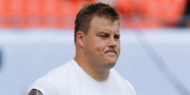 MIAMI GARDENS, FL - OCTOBER 20: Richie Incognito #68 of the Miami Dolphins warms up prior to the game against the Buffalo Bil