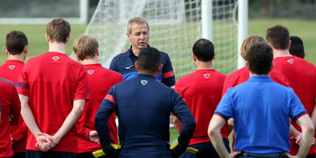 LOS ANGELES, CA - JANUARY 07: Head Coach Juergen Klinsmann of the U.S. Men's National Soccer team addresses his players during training at StubHub Center on January 7, 2014 in Los Angeles, California. (Photo by Victor Decolongon/Getty Images) 