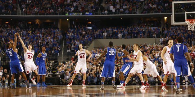 Kentucky Wildcats guard Aaron Harrison (2) makes a three-point shot in the closing seconds as the Kentucky Wildcats beat the Wisconsin Badgers 74-73 in the second semifinal game of the Final Four at AT&T Stadium Saturday, April 5, 2014 in Arlington, Texas. (Ron Jenkins/Fort Worth Star-Telegram/MCT via Getty Images)