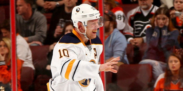 PHILADELPHIA, PA - APRIL 06: Christian Ehrhoff #10 of the Buffalo Sabres skates off the ice after his ear was cut in the third period against the Philadelphia Flyers at Wells Fargo Center on April 6, 2014 in Philadelphia, Pennsylvania.The Philadelphia Flyers defeated the Buffalo Sabres 5-2. (Photo by Elsa/Getty Images)