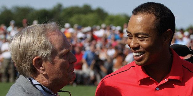 DUBLIN, OH - JUNE 03: Tournament founder Jack Nicklaus greets Tiger Woods as he walks off the 18th green during the final round of the Memorial Tournament presented by Nationwide Insurance at Muirfield Village Golf Club on June 3, 2012 in Dublin, Ohio. (Photo by Scott Halleran/Getty Images)