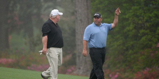 AUGUSTA, GA - APRIL 07: Kevin Stadler (R) of the United States walks with his father Craig Stadler of the United States putts during a practice round prior to the start of the 2014 Masters Tournament at Augusta National Golf Club on April 7, 2014 in Augusta, Georgia. (Photo by Harry How/Getty Images)