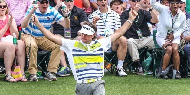Bubba Watson, celebrates a long birdie putt on the 14th green in the second round at the Masters Tournament in August, Ga., on Friday, April 11, 2014. (Tim Dominick/The State/MCT via Getty Images)