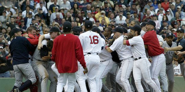 Boston Red Sox and the New Yankees brawl in the third inning after Yankees batter Alex Rodriguez was hit by a pitch by Red Sox's Bronson Arroyo at Fenway Park in Boston. The Red Sox won, 11-10, with a 9th-inning game winning home run by Bill Mueller (Photo by J Rogash/Getty Images)