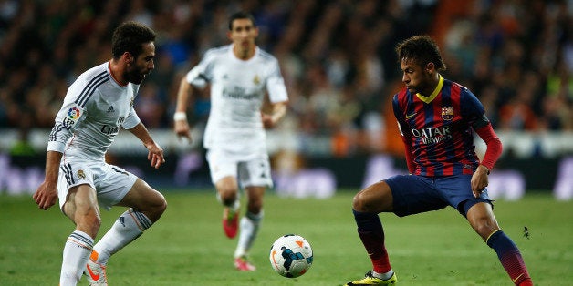 MADRID, SPAIN - MARCH 23: Daniel Carvajal of Real Madrid closes down Neymar of Barcelona during the La Liga match between Re