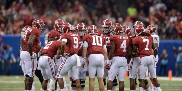 NEW ORLEANS, LA - JANUARY 2: Quarterback AJ McCarron #10 of the Alabama Crimson Tide commands a huddle during second half action of the Tide's loss to the Oklahoma Sooners in the BCS Sugar Bowl on January 2, 2014 at Mercedes-Benz Superdome New Orleans, Louisiana. (Photo by Jackson Laizure/Getty Images)