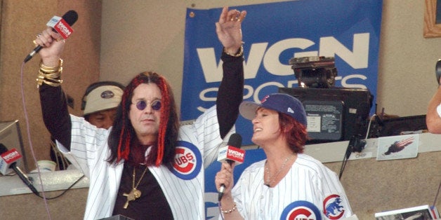 CHICAGO - AUGUST 17: Celebrity Ozzy Osbourne and his wife Sharon sing 'Take Me Out to the Ball Game' during the seventh inni