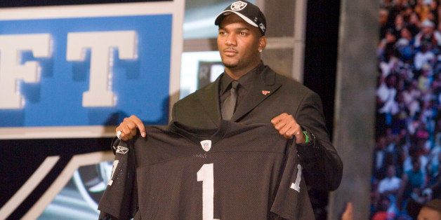 Apr 28, 2007 - New York, NY, USA - The NFL Draft was held at Radio City Music Hall in New York City. JaMarcus Russell was selected by the Raiders with the no. 1 overall pick. Calvin Johnson went to the Lions with the second pick. Gaines Adams went to the Buccaneers with the 4th pick. Adrian Peterson went to the Vikings with the 7th pick. Brady Quinn went to the Browns with the 22nd pick. PICTURED: JAMARCUS RUSSELL. (Photo by John Dunn/Sporting News via Getty Images)