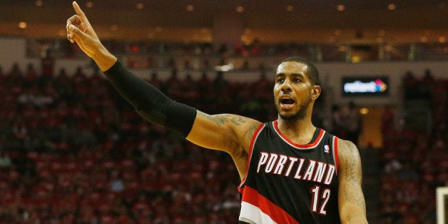 HOUSTON, TX - APRIL 23: LaMarcus Aldridge #12 of the Portland Trail Blazers celebrates a play on the court in the second hal
