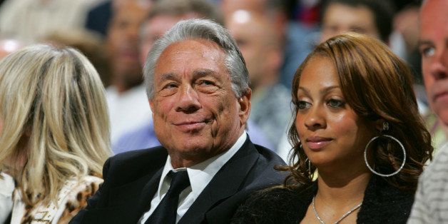 DENVER - APRIL 29: Los Angeles Clippers owner Donald Sterling (L) watches game four of the Western Conference Quarterfinals with LaLa Vasquez (R), MTV VJ and fiancee of Carmelo Anthony #15 of the Denver Nuggets, during the 2006 NBA Playoffs at the Pepsi Center on April 29, 2006 in Denver, Colorado. NOTE TO USER: User expressly acknowledges and agrees that, by downloading and or using this photograph, User is consenting to the terms and conditions of the Getty Images License Agreement. Mandatory Copyright Notice: Copyright 2006 NBAE (Photo by Garrett W. Ellwood/NBAE via Getty Images)
