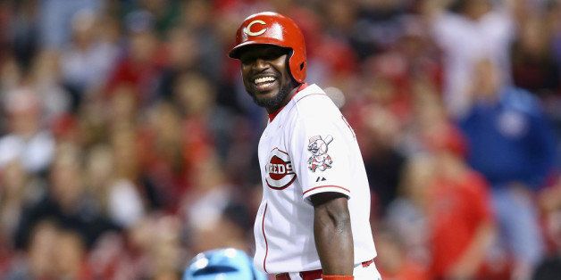 CINCINNATI, OH - APRIL 11: Brandon Phillips #4 of the Cincinnati Reds waits to bat in the 9th inning during the game against the Tampa Bay Rays at Great American Ball Park on April 11, 2014 in Cincinnati, Ohio. (Photo by Andy Lyons/Getty Images)